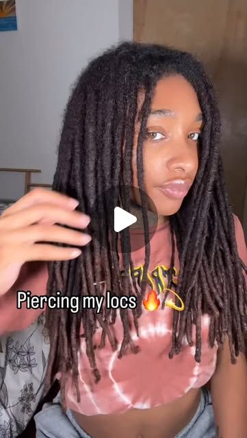 Piercing my locs is just one way I express my unique style. My locs, my way! 💖
-
-
- There’s no limit to how you can accessorize- spikes, beads, or anything in between. The possibilities are endless when it comes to making your locs stand out. Why settle for ordinary when you can turn heads? 

- comment for link or find LocXuries in bio <3
- 
- 
-
-
#dreads #dreadstagram #reels #explorepage  #dreadlocks #locstyles #naturalhair #loclife #hairinspiration #hairaccessories #hairgoals #locs" Combing My Locs Out, Artificial Dreads Styles, Beginner Locs For Women, Real Locs On Black Women, Baddies With Locs, Thick Loc Styles, Freeform Locs Women, Small Starter Locs, Medium Loc Styles Women