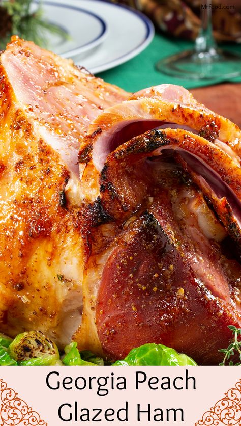 We're bringing the Southern taste of Georgia peaches to your Christmas dinner table with this ham recipe! The only thing better than the way our Georgia Peach Glazed Ham looks, is the way it tastes; our secret is mixing peach preserves with brown sugar! Trust us when we say this Christmas ham recipe is going to be the most heavenly thing you eat all season. Peach Glaze For Ham, Peach Ham Glaze Recipe, Southern Christmas Dinner, Peach Glazed Ham, Georgia Recipes, Ham Ideas, Christmas Ham Recipes, Best Cranberry Sauce, Ham Recipes Baked