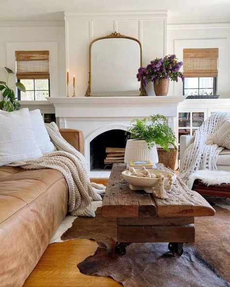 White Living Room Leather Couch, Coffee Table In Front Of Fireplace, Leather Couch Cottage Style, White Fireplace Mantle Ideas, Coffee Table With Leather Couch, Cozy Leather Couch Living Rooms, Brown Leather Couch Living Room Ideas, Leather Couch Styling, Couch In Front Of Fireplace