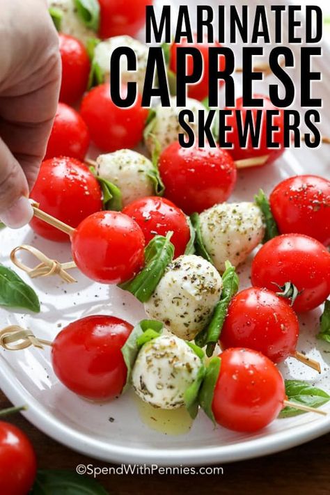 Caprese skewers are a tasty combination of cherry tomatoes, mozzarella balls, and fresh basil, then drizzled with a balsamic glaze. They are the perfect mini appetizer to serve at your next party or gathering. #spendwithpennies #capreseskewers #caprese #appetizer #miniappetizer Mozzarella Appetizers, Tomato Skewers, Caprese Appetizer, Caprese Salad Skewers, Marinated Cheese, Ensalada Caprese, Mozzarella Balls, Skewer Appetizers, Tomatoes Mozzarella