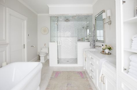 Now this is a bathroom. A large soaking tub, dual vanities, a walk-in shower and overall calming color scheme make for the ultimate master suite retreat. It’s obvious why Harris says it’s “one of my favourite rooms in the house!” Jillian Harris Home, Jillian Harris, Master Ensuite, Chic Spaces, Cabinetry Design, Master Bath Remodel, Porcelain Floor, Shower Stall, Bathroom Reno