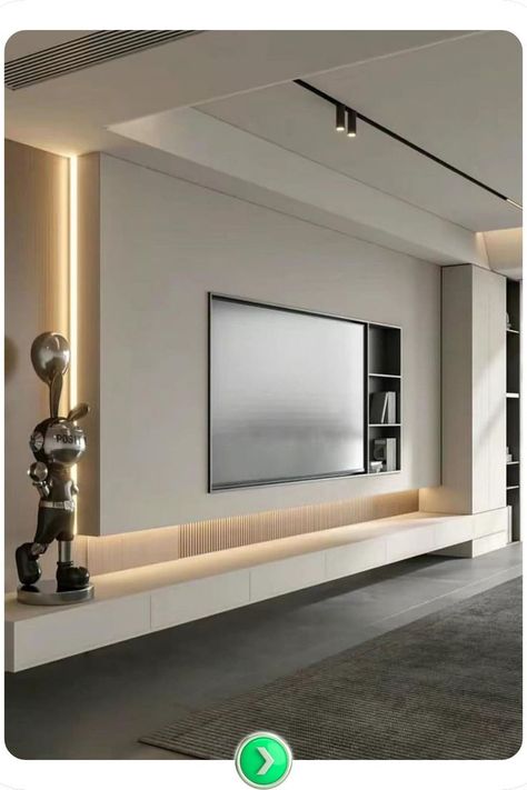 Bright and minimal TV wall with sculptural details, clean lines, and a fresh white aesthetic that enhances any modern and clutter-free interior. Minimal Tv Wall, Tv Wall Design Luxury, Luxury Tv Wall, Dnevna Soba, House Interior Inspiration, House Interior Decor Ideas, Diy Play Kitchen, Tv Wall Design, Tv Unit Design