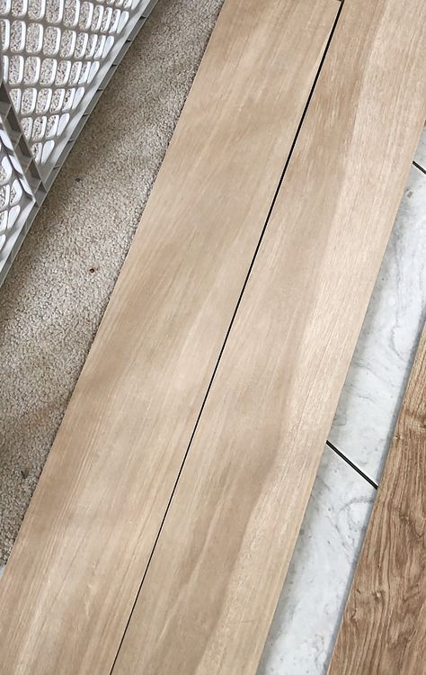 Benefits of using wood look tile on your main level Oak Porcelain Tile Floor, Tiles That Look Like Wood Floors, Best Wood Tile Flooring, White Oak Tile, Wood Like Porcelain Tile Flooring Ideas, Wood Look Porcelain Tile Floors Bathroom, Wood Look Tile Flooring, Wood Tile For Bathroom, Bathroom Floor Wood Tile