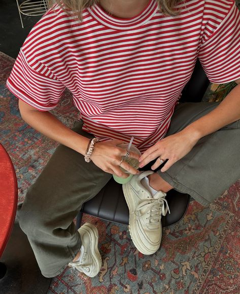 is very into stripes this year 🍓🍵 tshirt is @calledtosurf 🫶 pinterest aesthetic, outfit ideas, outfit inspiration, spring fashion, casual style, tomboy chic #calledtosurf #inspobykooba #aestheticfashion #tomboychic #aestheticfeed #pinterestgirl #pinterestphoto #coffeeshop #outfitinspo #ltkfashion #casualchic #casualstyle #fashionblogger #streetstyle #ootd Striped Tshirt Outfits, Style Tomboy, Called To Surf, Tomboy Chic, Spring Fashion Casual, Aesthetic Outfit Ideas, Pinterest Aesthetic, Ideas Outfit, Aesthetic Outfit