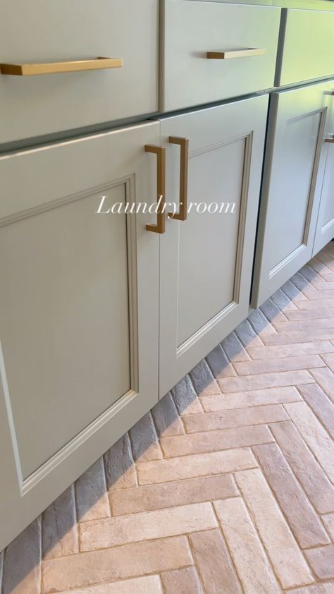 Laundry Room Herringbone Floor, Unusual Gray Cabinets, Laundry Room Herringbone Tile Floor, Capella Ivory Brick Floor, Msi Capella Ivory Brick, Laundry Room Brick Floor, Brick Laundry Room Floor, Taupe Laundry Room, Brick Floor Laundry Room