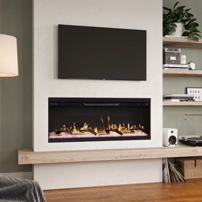 Customize your viewing experience with the Modern Ember Skyline 50-in 3-sided Smart Electric Fireplace Insert! Tailor your setup for front views (fully recessed), front and side views (corner wall install), or 3-sided views (partially recessed), each offering stunning perspectives of realistic LED flames and ambient down lighting. Take control of your comfort using the digital control touch panel, Wi-Fi app, or voice commands with Alexa or Google. Set your desired room temperature and heating du Modern Farmhouse Electric Fireplace Ideas, Fireplace Insert Design, Tv Fireplace Modern, Single Side Built In Fireplace, Small Living Room Electric Fireplace, Fireplace Flush To Wall, Accent Color Fireplace, Electric Fireplace Master Suite, Three Sided Electric Fireplace