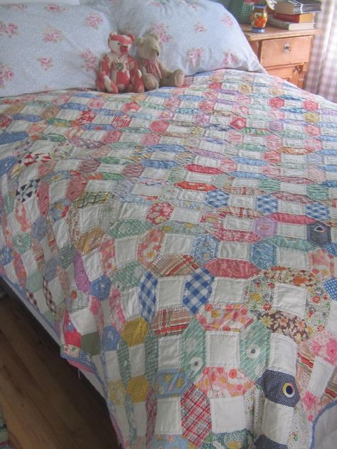 Here is a lovely quilt that you will rarely find on the market, a vintage feedsack scrap quilt. Now let me tell you-- I made this one. I used a vintage feedsack top and hand quilted it, using a cotton batting and a Mayhew print (Still can be found if you wanted to make matching pillowcases) on the backing. This has been a labor of love for me, as it is just beautiful, and a pleasure for me to hand quilt. It is charming and is made out of a lovely group of colors and a huge variety of fabrics fro Scrap Quilt Blocks, Scrap Fabric Quilt, Quilts For Beginners, Top Fabrics, Liberty Quilt, Feedsack Quilt, Reproduction Fabric, Vintage Quilts Patterns, Vintage Quilts Antiques