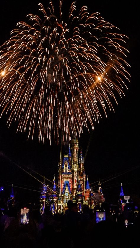 Cinderella Castle in Magic Kingdom, lit up in red blue and gold projections with a giant firework in full bloom, exploding over top of it Magic Kingdom Fireworks, Disney Prom, Firework Show, Disney Poses, Enchanted Kingdom, Disney 2024, Disney World Florida, Fireworks Show, The Enchantments