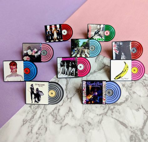 Fleetwood Mac Enamel Pins on Vinyl Record Album

Beautiful enamel pins of the iconic rock band Fleetwood Mac, displayed on a vintage vinyl record album. #fleetwoodmac #pins #vinyl . #Enamel_Pins_Aesthetic #Harry_Styles_Butterfly #Band_Pins #Harry_Tattoos Enamel Pins Aesthetic, Merch Ideas Products, Harry Styles Butterfly, Enamel Pin Design, Band Pins, Harry Tattoos, Punk Fashion Diy, Enamel Pin Collection, Acrylic Pins