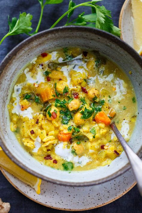 This creamy vegan Chickpea Soup recipe is like sunshine in a bowl. Made with veggies and rice in a golden turmeric coconut milk broth. A cheery soup for cozy winter days. Gluten-free. Soup Dinner Recipes, Hearty Vegetarian Soup, Veggies And Rice, Feasting At Home, Vegan Chickpea, Vegetarian Soup Recipes, Chickpea Soup, Fresh Turmeric, Vegan Soup Recipes