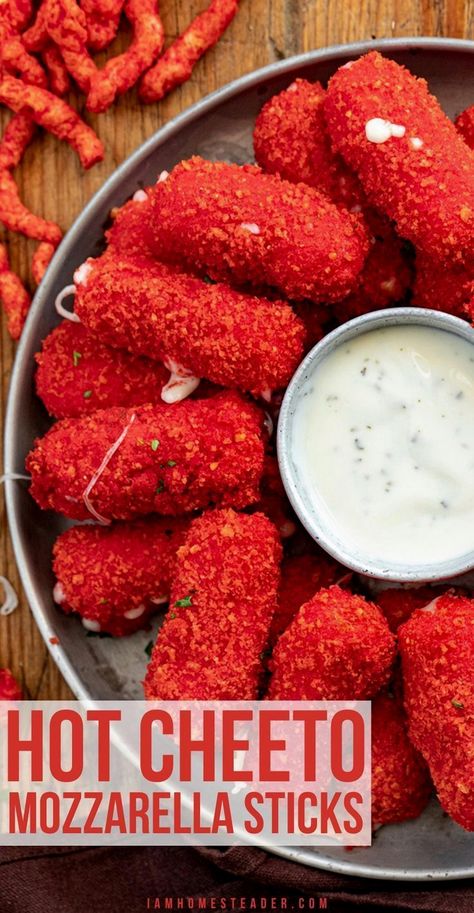 On January 23, 2023, a bold twist on a classic appetizer emerged: Hot Cheeto Mozzarella Sticks. These spicy bites feature string cheese enveloped in a crunchy layer of Flamin' Hot Cheetos, delivering a fiery kick with every bite. String Cheese Mozzarella Sticks, Cheeto Mozzarella Sticks, Hot Cheeto Mozzarella Sticks, Diy Snack Ideas, Cheetos Recipe, Diy Food Ideas, Mozzarella Sticks Recipe, Recipes By Ingredients, Cheesy Appetizer