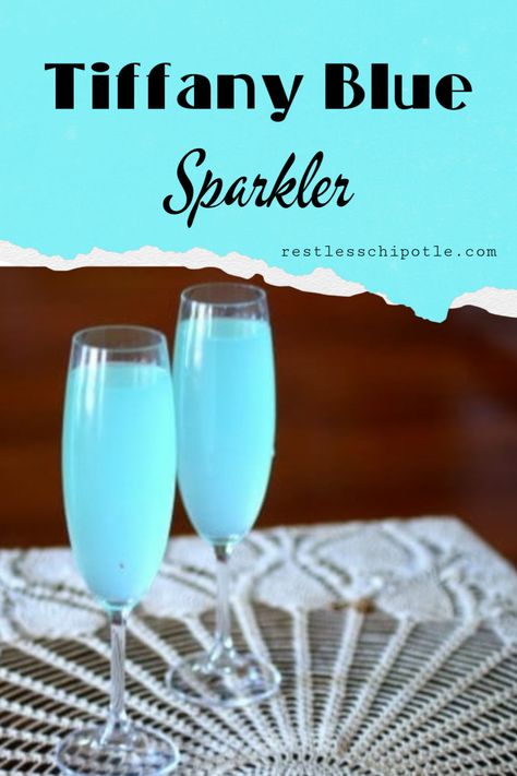 Pretty, sparkly Tiffany Blue Cocktail is similar to a blue mimosa. It's perfect for bridal showers, Mother's Day, Easter, or anytime you want a light, pretty drink to serve.  #recipe #wedding #drinks #easy #mimosa #babyshower #party #withoutcuracao #mothersday #valentinesday #blue #Hypnotiq Tiffany Blue Cocktail Drink Recipes, Hypnotiq Drinks Recipes, Tiffany Blue Cocktail, Light Blue Drinks Alcohol, Tiffany Blue Mimosa, Tiffany Cocktail, Light Blue Alcoholic Drink, Something Blue Drink, Tiffany Mimosa Recipe