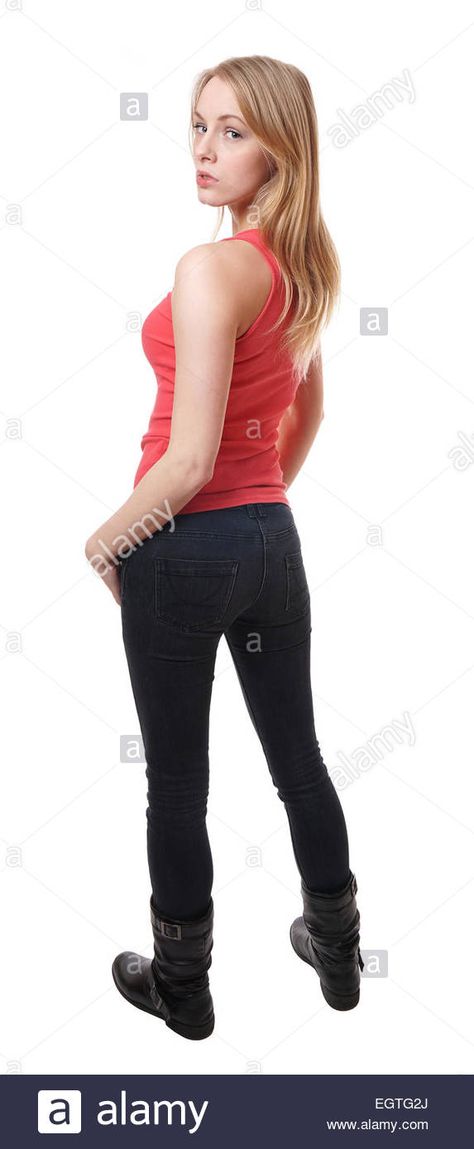 Download this stock image: woman looking over shoulder - EGTG2J from Alamy's library of millions of high resolution stock photos, illustrations and vectors. Pose Reference Looking Over Shoulder, Looking Over The Shoulder Pose, Woman Looking Over Shoulder, Looking Over Shoulder, Stock Photos Woman, Art Help, Female Pose Reference, Human Reference, Body Reference Poses