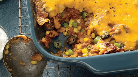 Deb Wise's Tamale Pie Mix-Up | Recipe: Deb Wise's Tamale Pie Mix-Up This ultimate comfort food is the one-dish casserole that you've been looking for. This hearty take on tamale pie is made with ground beef, cornmeal, tomato sauce, and corn, and is topped with a layer of golden, melted cheese. Served with a big green salad and some chips and salsa, this crowd-pleasing dinner recipe is just what you need to add into your meal rotation. Sign us up! Tamale Casserole, Freezer Recipes, Tamale Pie, Comfort Casseroles, Ceramic Baking Dish, Baked Casserole, Spicy Sauce, Feeding A Crowd, Classic Dishes