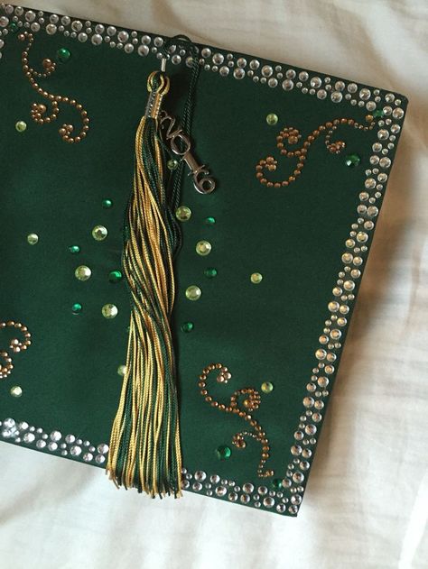 Jeweled Graduation Caps, High School Grad Cap Ideas 2023, Graduation Cap Designs Green And Gold, Cute Cap For Graduation, Green Graduation Aesthetic, Gold Grad Cap Ideas, Embroidered Grad Cap, Green Graduation Cap Ideas, Art Student Graduation Cap