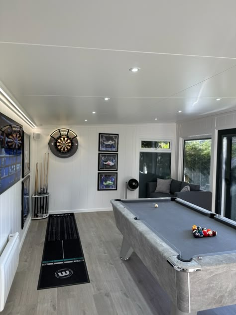 Looking to create a sophisticated and stylish outdoor man cave in the UK?

Or perhaps you want a space that can be both a man cave and a family entertainment room. This garden building is the perfect solution. 

Featuring an incredible pool table, garden bar and Chelsea Football Memorabilia, this one is a showstopper. Bar Pool Table Room, Pool House Man Cave Ideas, Home Bar And Pool Table Room, Home Pool Room Ideas, Pool Table Man Cave, Outdoor Games Room Ideas, Games Room Pool Table, Men Game Room Ideas Man Cave, Outdoor Gaming Room