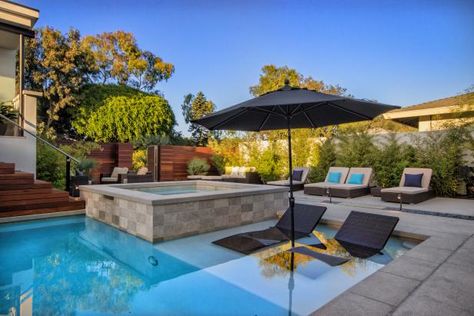 Pool With Patio, Hot Tub and Submerged Lounge Chairs | HGTV Gorgeous Patio, Best Patio Umbrella, Pool Pictures, Pool Stuff, Hot Tub Accessories, Modern Remodel, Pool Fun, Neutral Fabric, Pool Picture