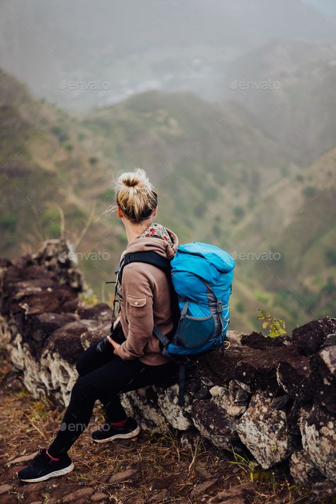 Female hiker with blue backpack staying on the stony cobbled trekking trail leading down to the by Shunga_Shanga. Female hiker with blue backpack staying on the stony cobbled trekking trail leading down to the valley between barren... #Sponsored #backpack, #staying, #stony, #Female Female Hiker, Outdoor Outfits, Fit Female, Backpacking Gear, Adventure Photography, Blue Backpack, Designer Backpacks, Body Image, Outdoor Outfit