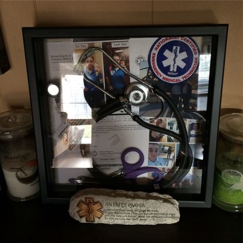 EMT shadowbox Emt Shadow Box Ideas, Ems Must Haves, Paramedic Gift Ideas, Emt Gift Ideas, Emt Graduation Pictures, Ems Decor, Female Emt, Emt Gifts, Emt School