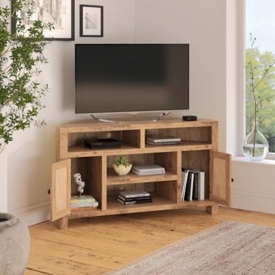 This beautifully designed TV cabinet has won everyone over with its practicality beyond its stylish appearance. It's not just a piece of furniture, it's also a way to showcase your unique taste and personality. | Loon Peak Jamian Creek 52 Inch Corner TV Stand For Tvs Up To 55 Inches Brown 30.0 x 52.0 x 16.0 in, Wood | C110699553 | Wayfair Canada Caddy Corner Tv Living Room, Corner Entertainment Center Ideas, Corner Tv Cabinet Ideas, Corner Tv Ideas Mounted Tv, Built In Corner Tv Cabinet, Corner Tv Unit Ideas Living Room, Tv In Corner Of Living Room Layout, Corner Tv Stand Ideas, Tv In Corner Of Living Room