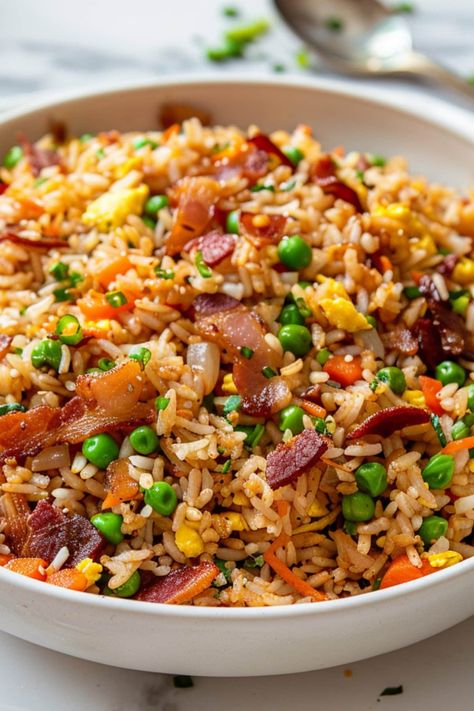 This savory bacon fried rice is packed with flavors and textures. I'm talking crispy, smoky bacon, tender vegetables, fluffy eggs, and an umami-rich sauce. Grilled Chicken Fried Rice, Bacon Egg Fried Rice, Dinner Recipes Rice Bowls, Fried Rice Sides, Chinese Comfort Food, Home Made Fried Rice, Summer Supper Ideas Healthy, Flavored White Rice, Things To Make With Rice