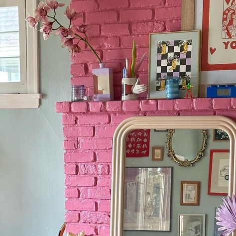 Eclectic pink fireplace with thoughtful mantle decor in a colourful heritage home Coral Fireplace, Maximalist Fireplace, Eclectic Fireplace, Pink Fireplace, Mantle Makeover, Modern Cottage Core, Colorful Homes, Fireplace Mantle Decor, Bachelorette Pad