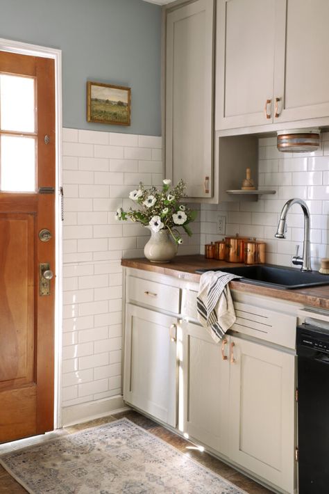 Budget Kitchen Renovation with DIY Shaker Painted Cabinets Removable Tile, I Spy Diy, White Tile Backsplash, Budget Kitchen, Shaker Cabinets, Stepping Stone, Diy Cabinets, Floor Covering, Kitchen On A Budget