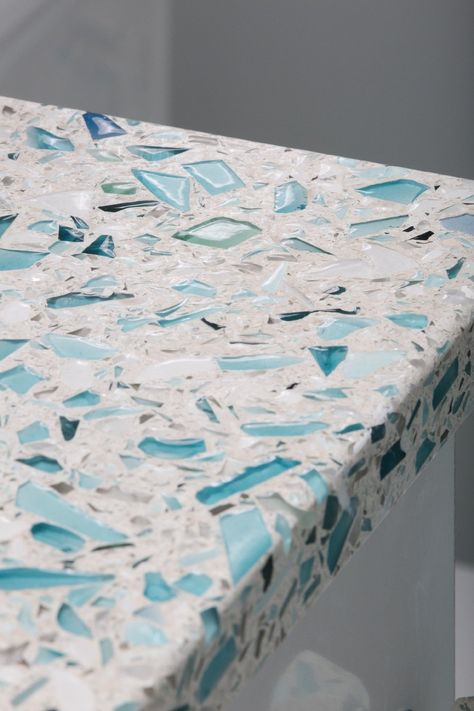 crushed-glass-countertop-vetrazzo-floating-blue-sea-pearl-finish Beach Cottage Kitchens, Coastal Cottages, Cottage Decorating, Glass Countertops, Honeycomb Blinds, Regal Design, Beach House Interior, Coastal Kitchen, Beach Cottage Style