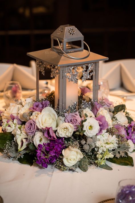 Purple Lantern Centerpieces, 15 Flower Centerpieces, Tangled Flower Arrangements, Light Purple Centerpieces, Tangled Wedding Centerpieces, Rapunzel Centerpiece Ideas Quince, Lavender Centerpieces For Quinceanera, Quince Table Centerpieces, Tangled Centerpieces