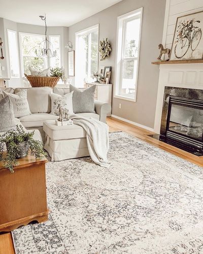 Beautiful farmhouse cottage style livingroom home with grey walls (Rodda Rand Moon is the color) honey oak floors, shiplap fireplace, and white and neutral decor pieces. Lots of vintage decor and antique furniture pieces with a cozy shabby interior design. This rug is the Ozona Area Rug from Boutique Rugs. rainandpine55 will save you 55% - Rain and Pine Honey Oak Floors, Golden Oak Floors, Oak Floor Living Room, Color Walls, Shiplap Fireplace, Oak Bedroom, Farmhouse Fireplace, Honey Oak, Estilo Country