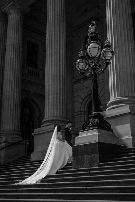 Step into the enchanting world of Jodie and Apollo's romantic and high-end editorial wedding photos captured at the historic Melbourne courthouse. The elegance, class, and romance of their day are perfectly captured, and you can witness the stunning Raffaele Ciuca Bridal gowns on full display. To book a wedding photographer who will capture every moment of your day in the most magical way, inquire on my website kyndel.co. Road Wedding Photos, Glamorous Wedding Photos, Private Wedding Photos, Old Time Wedding Photos, Vogue Wedding Editorial Photography, Melbourne Wedding Photography, Old Money Wedding Photos, Classy Wedding Photos, Vogue Wedding Photography