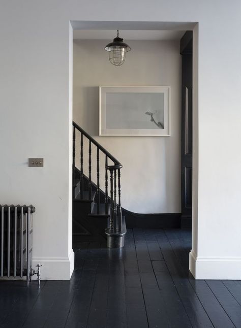 15 Painted Floors That Will Make You Want To Grab A Paintbrush Sally House, Hallway Makeover Before And After, Black Floorboards, Black Floors, Painted Floorboards, Hallway Makeover, Painted Wood Floors, Dark Floors, Hallway Designs