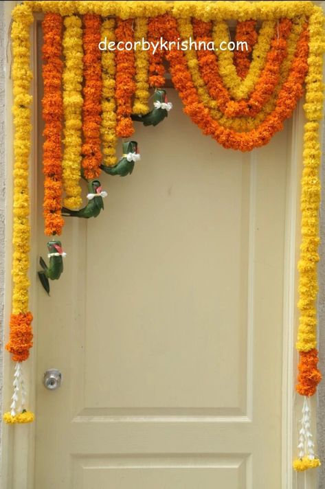 Home Door Flower Decoration, Flower Decoration For Door, Gruhapravesam Decoration Ideas Usa, Gruhapravesam Decoration Ideas, Door Flower Decoration, Diwali Decoration Lights, Mehendi Decor Ideas, Home Flower Decor, Ganpati Decoration At Home