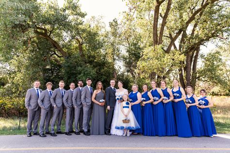 Chicago wedding party in royal blue and gray at Illinois forest preserve Royal Blue Wedding Theme Groomsmen Bridesmaid Dresses, Groomsmen Attire Royal Blue, Royal Blue And Silver Bridesmaid Dresses, Royal Blue Wedding Groomsmen, Royal Blue Wedding Theme Groomsmen, Royal Blue And Grey Wedding, Winter Wonderland Wedding Bridesmaids, Royal Blue Groomsmen Attire, Royal Blue Groomsmen