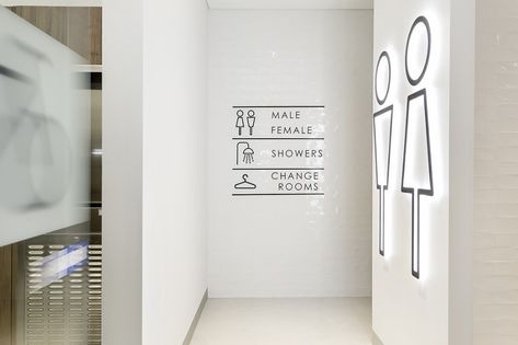 How to design end of trip with sustainability in mind | Architecture & Design Office Bathroom Design, Masdar City, Toilet Signage, Wc Sign, Wayfinding Signage Design, Office Furniture Solutions, North Sydney, Gym Interior, Public Bathrooms