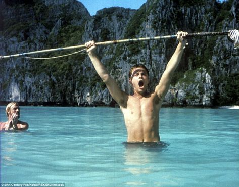 DiCaprio wades in the water of Maya Bay during a scene in the movie The Beach. In the film he plays a young American traveller seeking adventure in Thailand Leonardo Dicaprio The Beach, Leonardo Dicaprio Pictures, Stranded Deep, Movies Cinematography, Summer Movies, Leonardo Dicaprio Photos, Leonardo Dicaprio Movies, Wade In The Water, Beaches Film