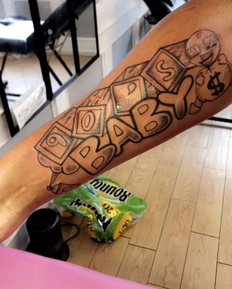 90's baby tattoo 2000 Baby Tattoo, Dre Tattoos, 90s Baby Tattoo, Heartless Tattoo, 90s Tattoos, Forearm Tattoo Quotes, Baby Tattoo Designs, Baby Tattoo, Money Tattoo