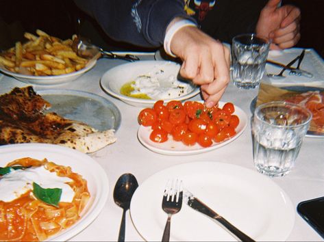 Food spread italian food film photography Vintage Italian Photography, Italian Film Aesthetic, Food In Film, Restaurant Film Photography, Restaurant Photography Interior, Food Flash Photography, Italian Food Table, Sharing Food Photography, Italian Food Menu