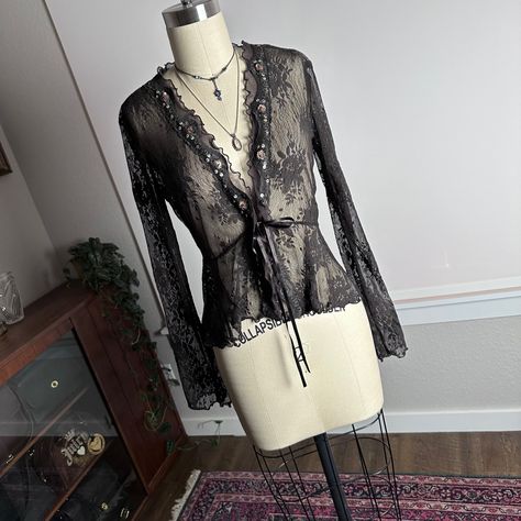 Vintage 90s 2000s sheer beaded lace ruffle extra long flare sleeve clasp bow tie front cardigan in like new condition. Size extra small but would fit someone small as well. Measurements: taken laying flat, chest 16.5”, waist 13”, hips 17.5”, sleeve 23”, length 19” and the fabric does have stretch #lacecardigan #fairy #cardigan #fairycore #2000s fairy core woodland y2k floral flower pattern grunge layering brown black fall inspo outfit jacket coat duster shirt cover up Black Lace Cardigan Outfit, Lace Cardigan Outfit, Duster Shirt, Fairy Cardigan, Black Lace Cardigan, Lace Outer, Sheer Cardigan, Tie Front Cardigan, Fall Inspo