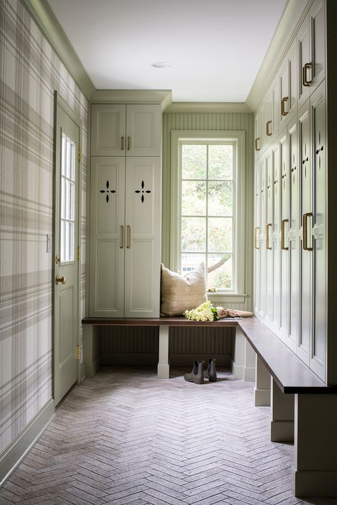 Traditional mudroom with green cabinetry, plaid wallpaper and brick herringbone floor @studiomkitchenandbath Mud Room Ideas Brick Floor, Brick Herringbone Wallpaper, Herringbone Brick Mudroom, Plaid Wallpaper Mudroom, Light Green Mudroom, Mudroom With Wallpaper, Mudroom Library, Traditional Mudroom, Mud Room Floor