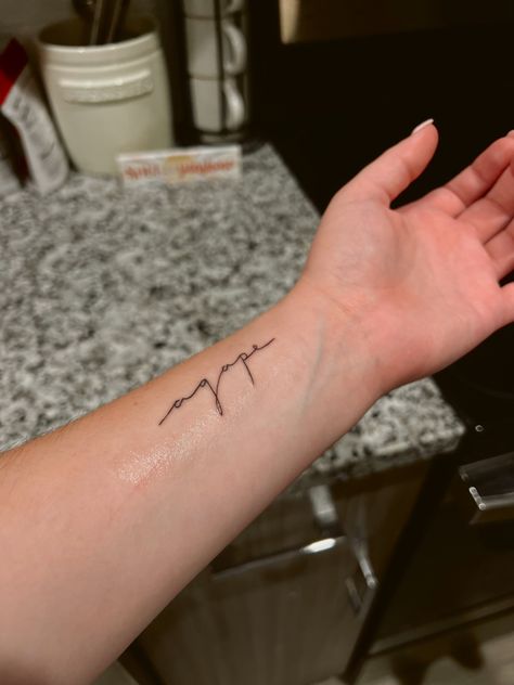 Agape tattoo Agape Love Tattoo, Script Tattoo Wrist, Dainty Biblical Tattoos, Wrist Script Tattoo, Small Script Tattoo, Script Tattoo Ideas, Handwritten Tattoo, Agape Tattoo, Beloved Tattoo