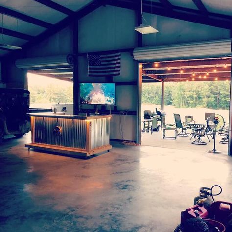 Barndominium With Roll Up Doors, Garage Hangout And Workshop, Garage Party Room Ideas, Garage Entertaining Space Ideas, Garage For Entertaining, Shop With Entertaining Area, Shop With Bar Area, Barn Entertaining Space, Roll Up Garage Door Ideas