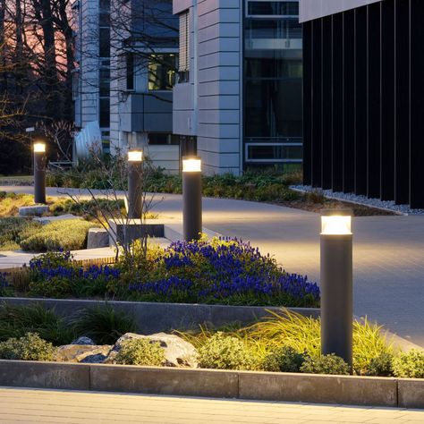 Paths connect people and places. They should be designed for practicality; to encourage movement and provide orientation in a safe environment. However, aesthetics should also be considered to enhance the urban environment and provide locational context. Path lighting that is successful is distinguished by the fact that it meets both these design and functional requirements. Fence Post Lights, Landscape Pathway Lighting, Outdoor Lamps, Landscape Lighting Design, Outdoor Path, Farmhouse Ceiling Fan, Outdoor Path Lighting, Solar Pathway Lights, Modern Outdoor Lighting