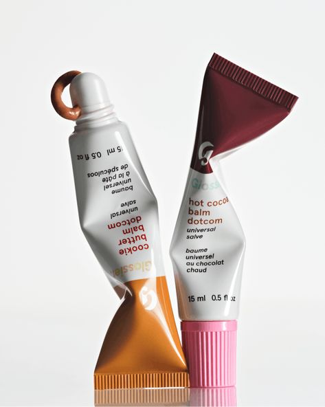 Glossier Cookie Butter Balm Dotcom, Caramel Lip Gloss, Glossier Ad Campaign, Glossier Branding, Balm Dot Com, Coral Berry, Glossier Products, Glossier Balm, Project Pan