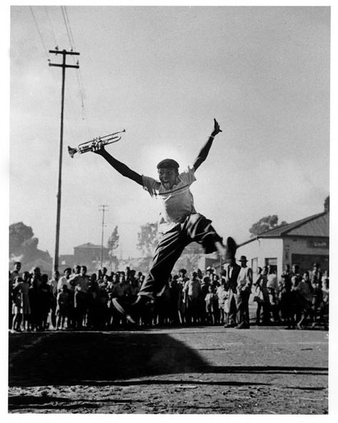 A teenage Hugh Masekela jumping for joy in Sophiatown with the trumpet he received from Louis Armstrong. 📷 Alf Kumalo. Music Art Cover, Hugh Masekela, Long Walk To Freedom, Roll Photography, Africa History, South African History, In The Air Tonight, Trumpet Players, Jump For Joy