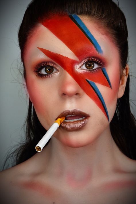 Red lighting bolt with blue highlights down face smoking a cigarette Aladdin Sane Makeup, David Bowie Makeup, David Bowie Costume, Aladdin Sane, 80s Party, Power Ranger, Diy Costumes, David Bowie, Adult Costumes