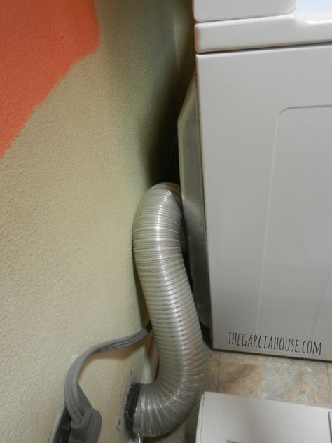 3 Ways to Push Your Dryer Against the Wall & Gain Floor Space Washer And Dryer Flush With Wall, How To Push Dryer Against Wall, Dryer Hose Hacks, Raised Dryer Only, Washer Dryer Hookup Cover, Open Laundry Room Ideas Hallways, How To Hide Dryer Vent Hose, Hide Dryer Vent Hose, Dryer Vent Ideas The Wall