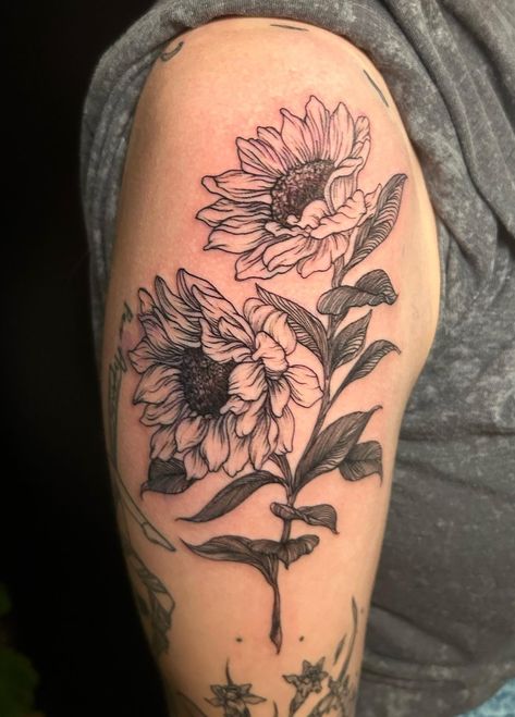 @colleenajsmith completed this delicate fine line sunflower tattoo. Her floral pieces always have some intuitive linework which makes them expressive, and as a result, most unique. Sunflowers Facing Each Other Tattoo, Sunflower Patch Tattoo, Knee Sunflower Tattoo, Men’s Sunflower Tattoo Ideas, Sunflower Tattoo Linework, Sunflower Knee Tattoo, Sunflower Tattoo Men, Sunflower Tattoo Back, Unique Sunflower Tattoos For Women