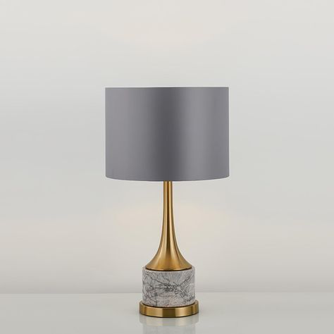 The beautiful Expino table lamp is stylishly suited to any space. and the lamp is finished with a slate grey shade. Opulent and classic in style, the Expino will light up any home. The high point of this contemporary table lamp has to be its beautiful grey marble-inspired base. The metal accents bring out the quality of the design. Finished with a slate grey shade. Opulent and classic in style. 
 PLEASE NOTE: Marble patterns vary by product, our product and the pictures shown are different . 
 I Contemporary Study, Nightstand Light, Gold Table Lamp, Nightstand Lamp, Contemporary Table Lamps, Stylish Living Room, Elegant Bedroom, Table Bar, Grey Marble