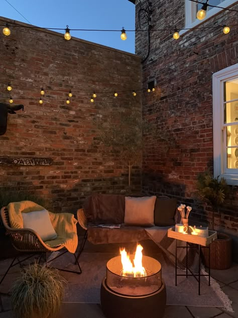 It’s perfectly feasible to transform our outdoor spaces, whatever size they may be, into sociable areas ready for autumn #autumn #garden #firepit #realhomes Design Per Patio, Small Courtyard Gardens, Courtyard Gardens Design, Back Garden Design, Small Courtyards, Patio Garden Design, Patio Interior, Backyard Garden Design, Small Garden Design